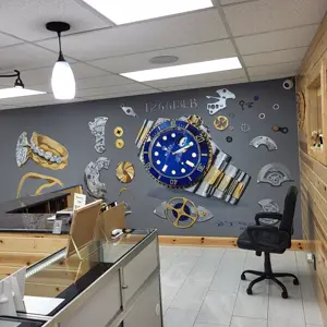 KC Gold and Diamond Traders - Watch Mural and Service Counter